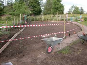 After the first day, much of the worst is done and the pitch is ready for its underlay and quarry stone.