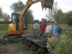 Bec hired a digger and thousands of innocent passer-bys were press-ganged into wheelbarrow service!